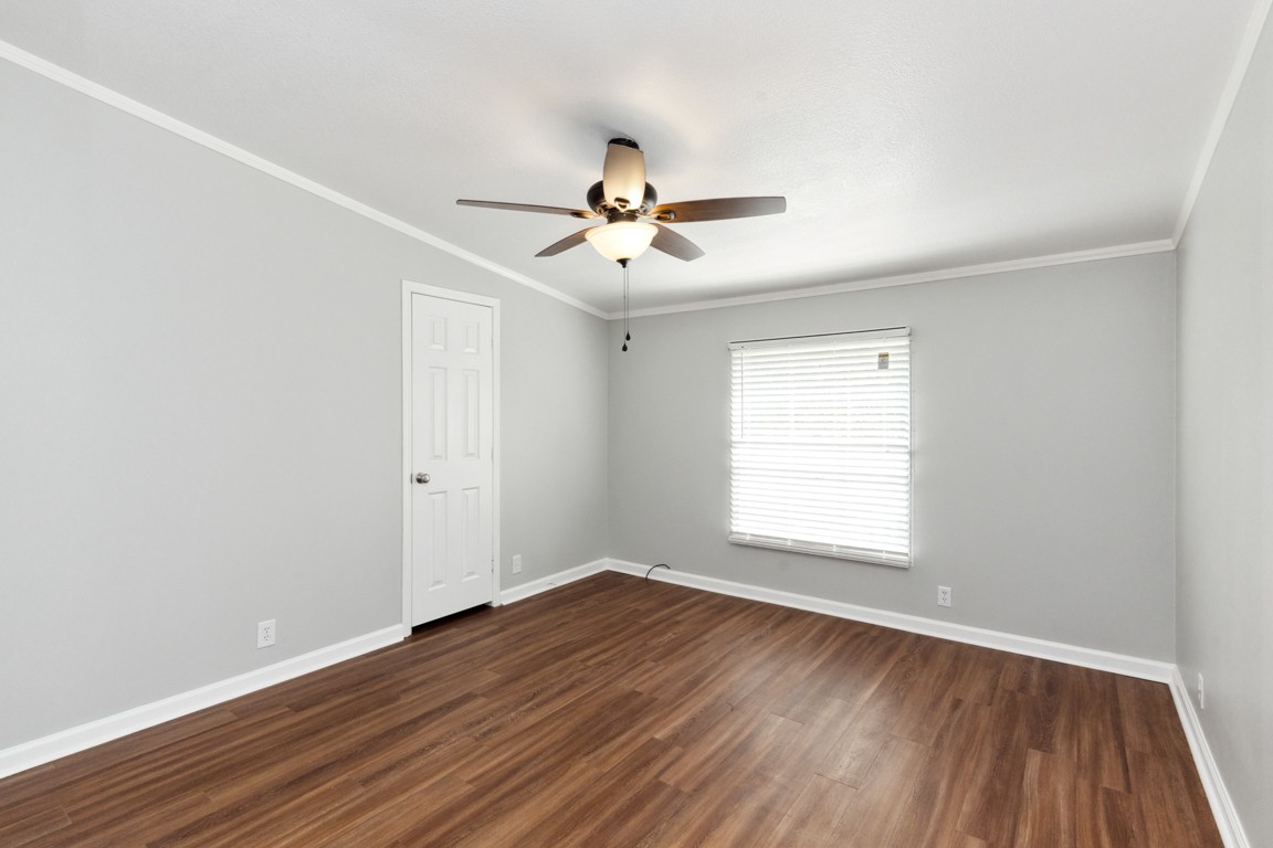 11201 New Zion Road Christiana, TN 37037 - Photo 8 of 19 an empty room with wooden floor and windows