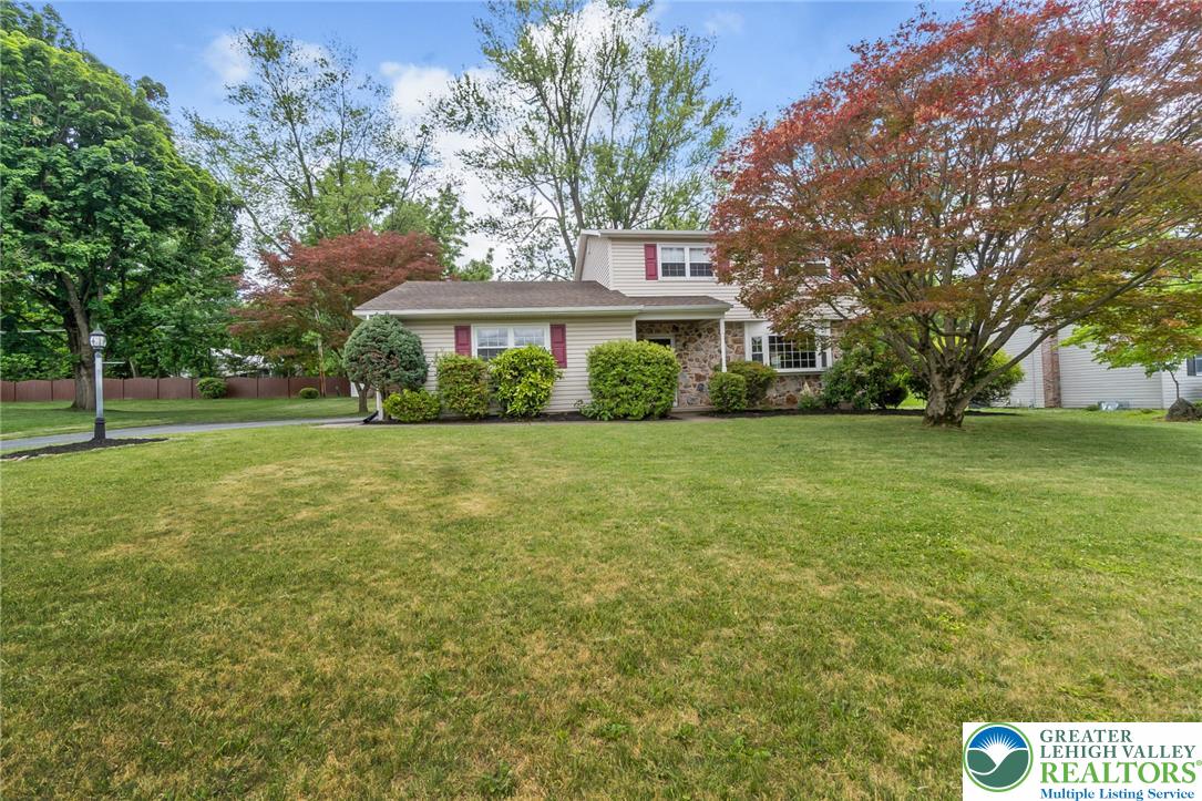 268 Apollo Drive Bethlehem, PA 18017 - Photo 42 of 56 Well-maintained exterior with vibrant landscaping welcomes you to this inviting residence.