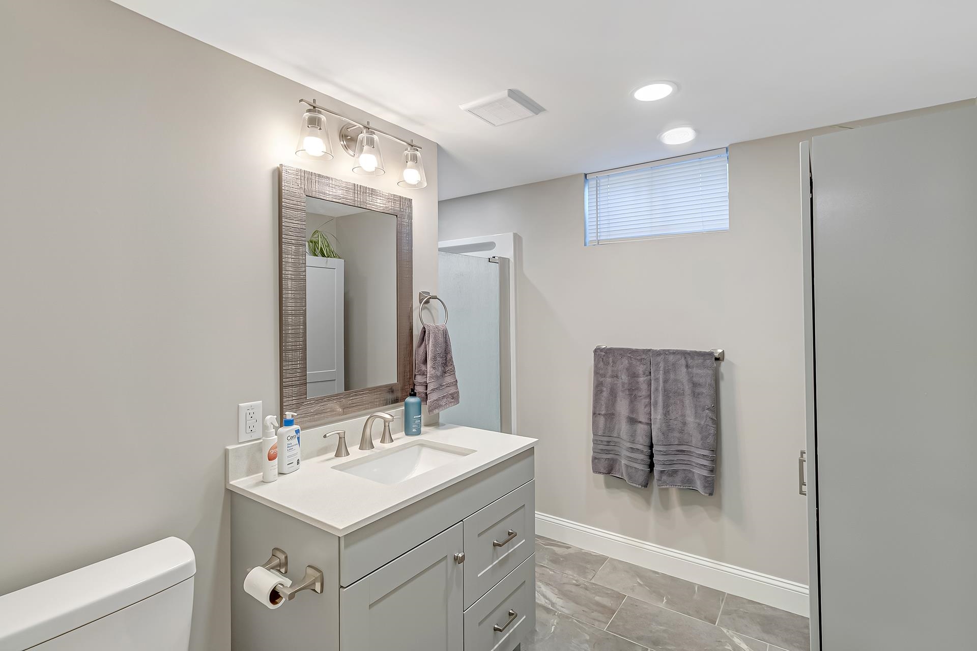 2118 Saguaro Road Grand Junction, CO 81507 - Photo 21 of 42 a bathroom with a sink toilet and shower