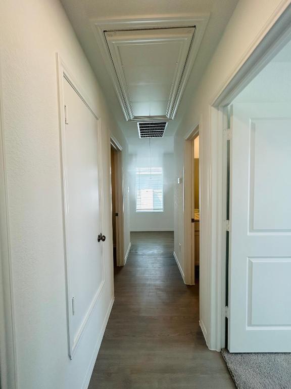 521 Cattle Queen Road Jarrell, TX 76537 - Photo 3 of 16 a view of hallway with stairs and wooden floor