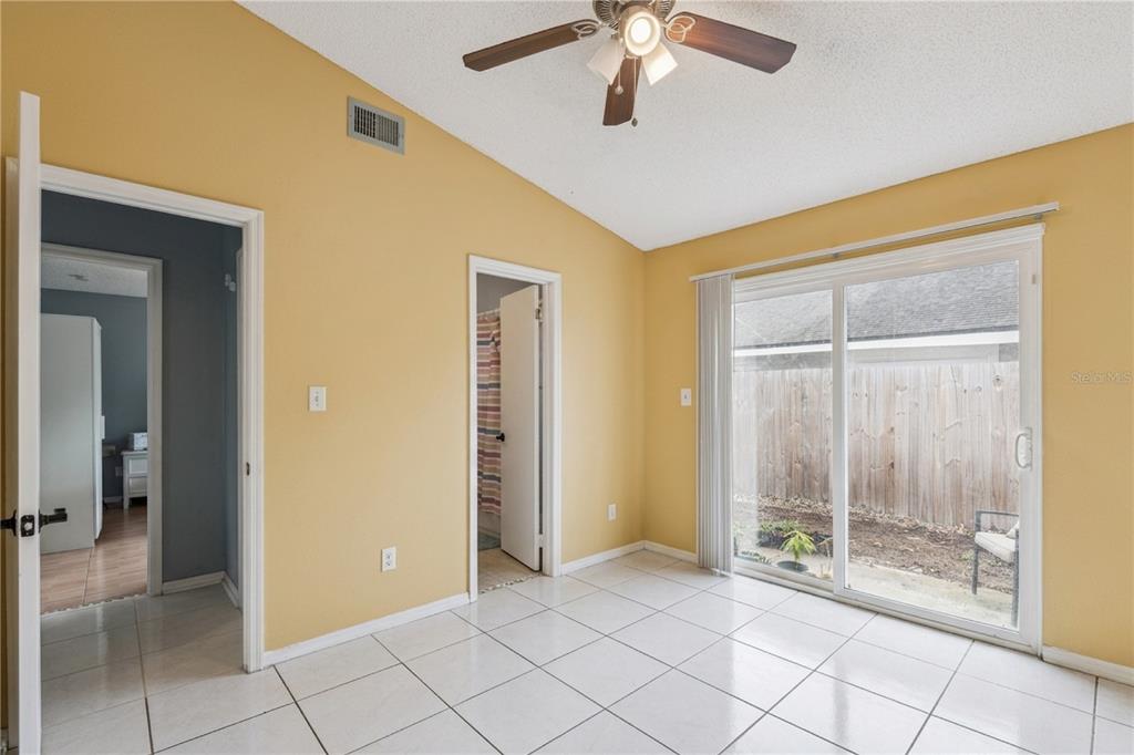 518 Torrey Avenue Altamonte Springs, FL 32714 - Photo 16 of 27 a view of a livingroom with a chandelier fan
