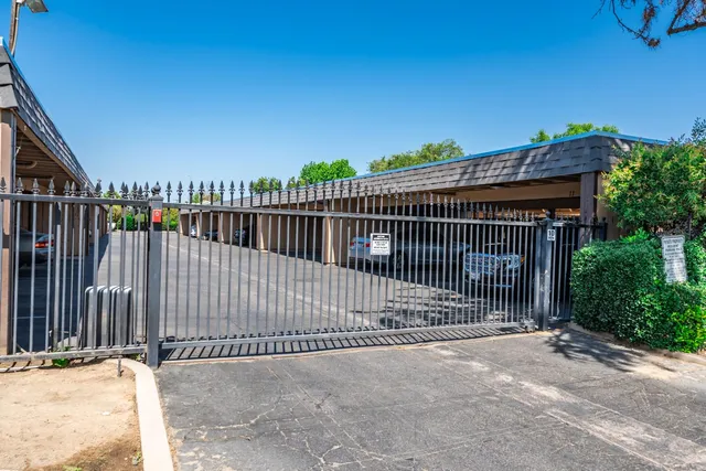 a view of a house with a street