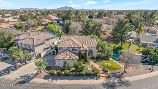 an aerial view of a house with a garden