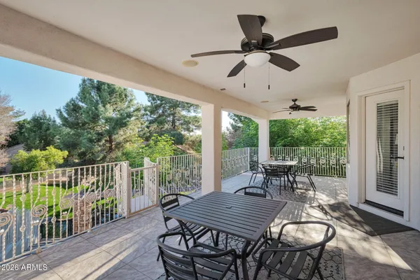 a outdoor view with a hardwood floor and a table
