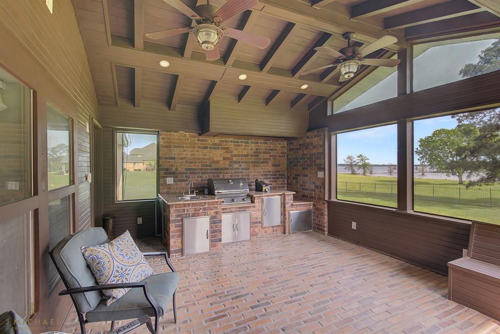 9747 Mathieu Drive Oil City, LA 71061 - Photo 4 of 37 Screened Porch/Outdoor Kitchen