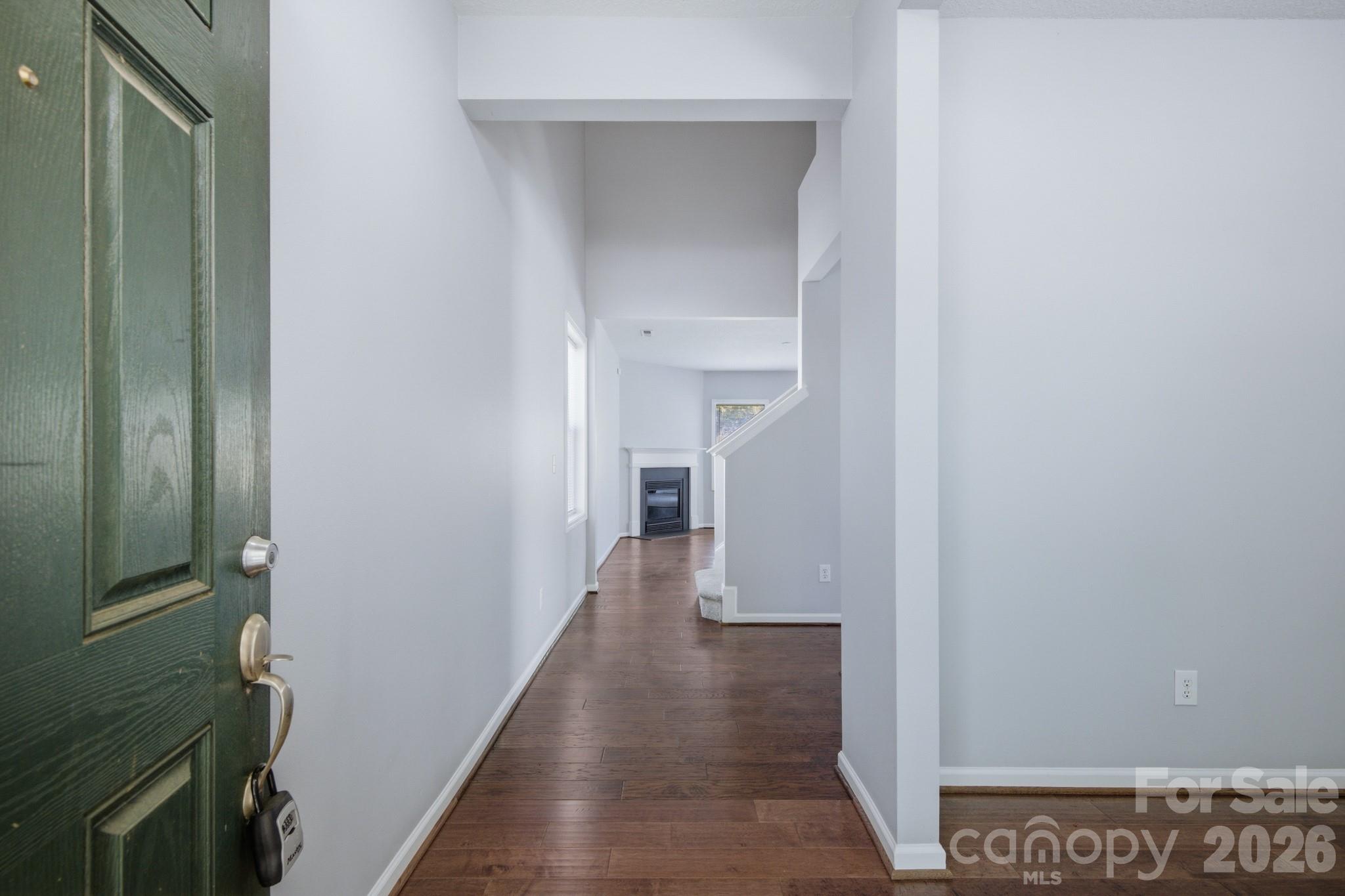 6404 Trotters Ridge Road Charlotte, NC 28227 - Photo 14 of 29 a view of a hallway with wooden floor