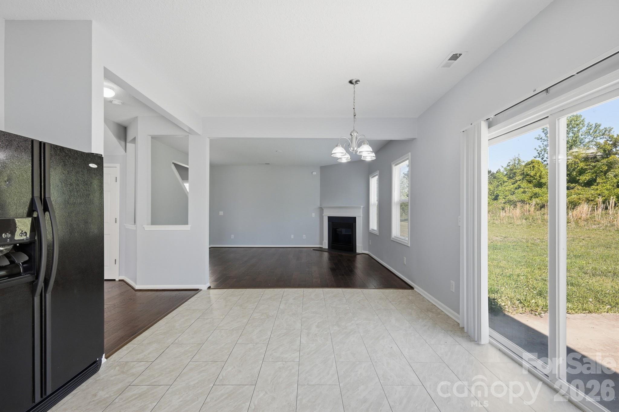 6404 Trotters Ridge Road Charlotte, NC 28227 - Photo 8 of 29 a view of a hallway with a chandelier