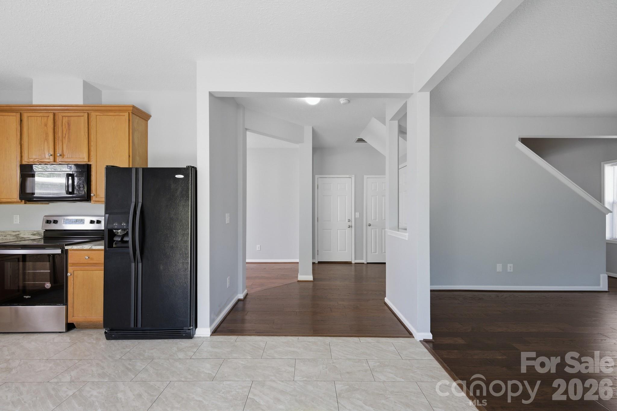 6404 Trotters Ridge Road Charlotte, NC 28227 - Photo 9 of 29 a view of a refrigerator in kitchen and a sink