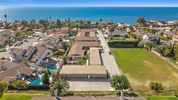 a view of a city with an ocean view