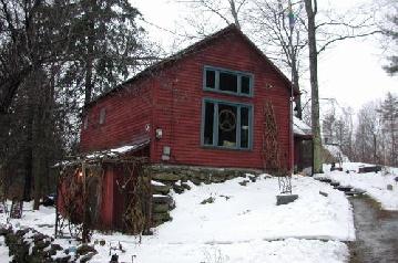 326 Old Stock Road Stockbridge, MA 01262 - Photo 1 of 2 a view of a house covered in snow