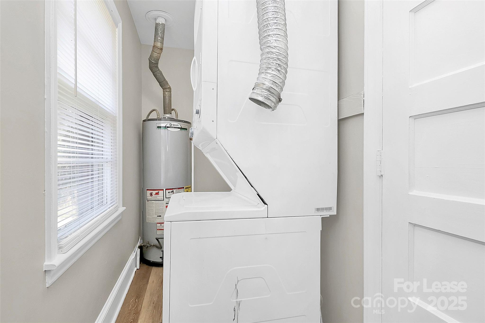 4919 Raymond Place Charlotte, NC 28205 - Photo 24 of 31 a utility room with dryer and washer