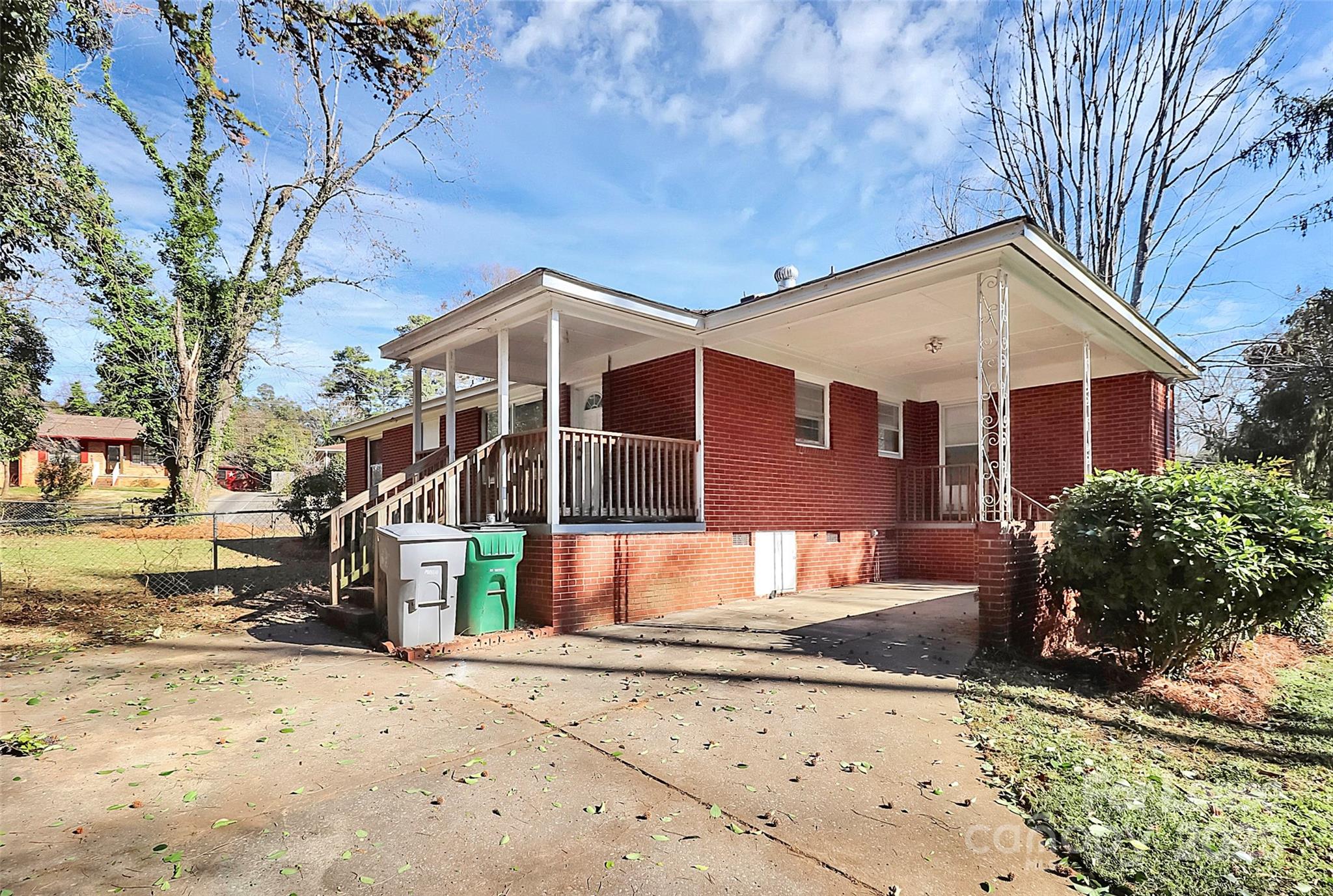 4919 Raymond Place Charlotte, NC 28205 - Photo 28 of 31 a front view of a house with a yard