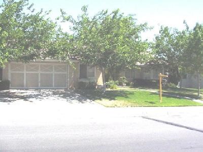 14520 Ponderosa Ranch Road Victorville, CA 92392 - Photo 1 of 1 a view of a house with a yard and large tree