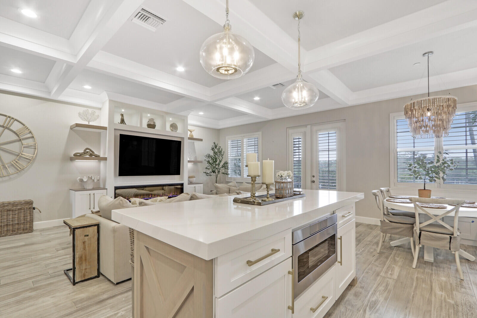 623 Inlet Waters Circle Jupiter, FL 33477 - Photo 13 of 51 a kitchen with a stove and a wooden floor