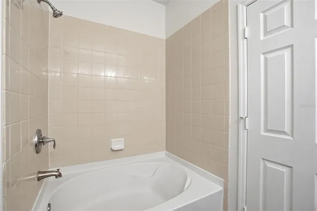 a bathroom with a bathtub