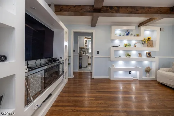 a view of a kitchen cabinets and stainless steel appliances