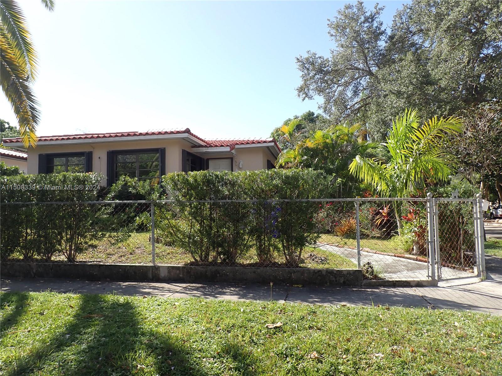 The Roads Miami, FL 33129 - Photo 2 of 3 a view of a yard in front of a house with a small yard