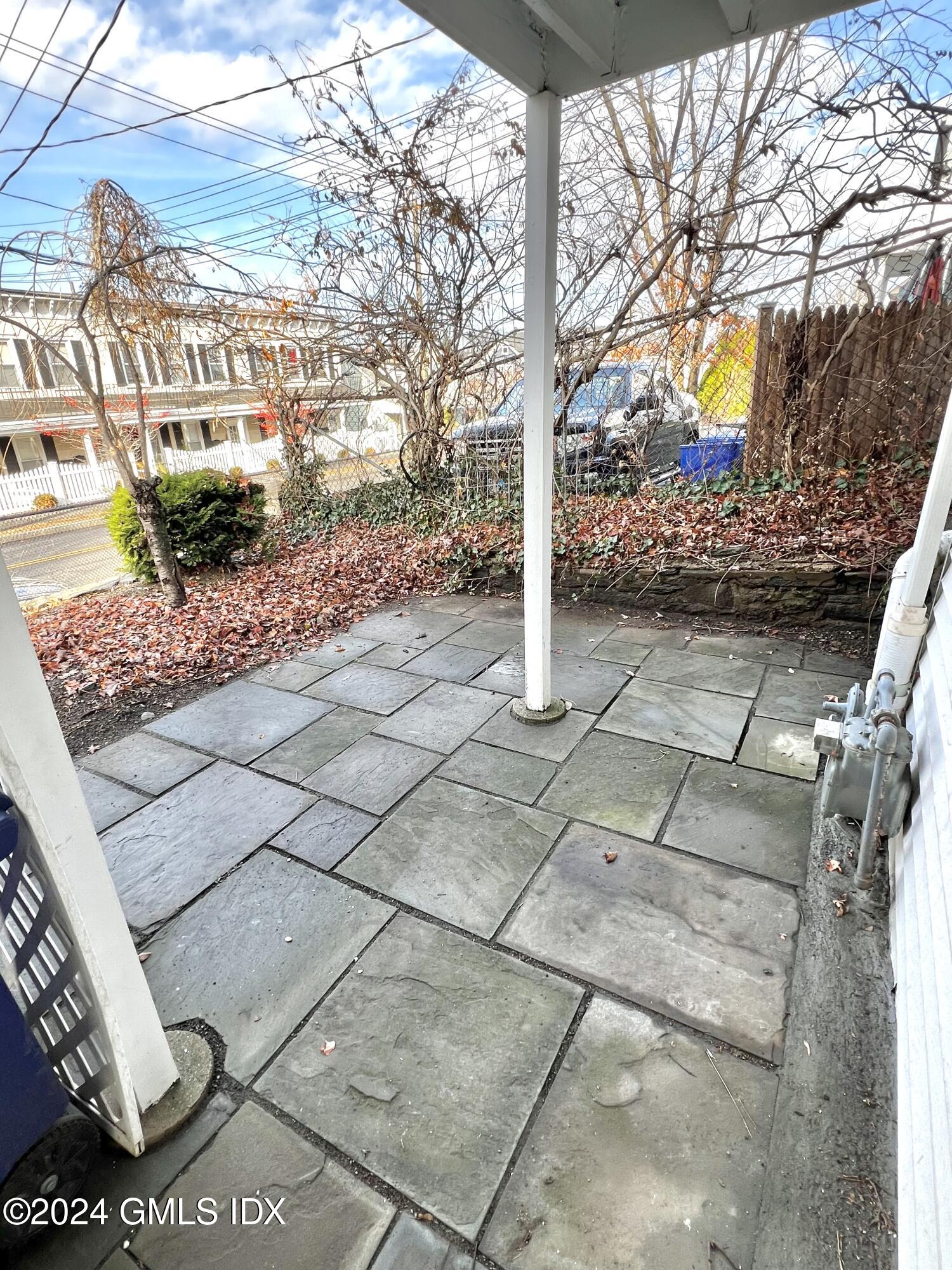 119 North Water Street, Unit 1 Greenwich, CT 06830 - Photo 11 of 11 a view of tall trees and a pathway