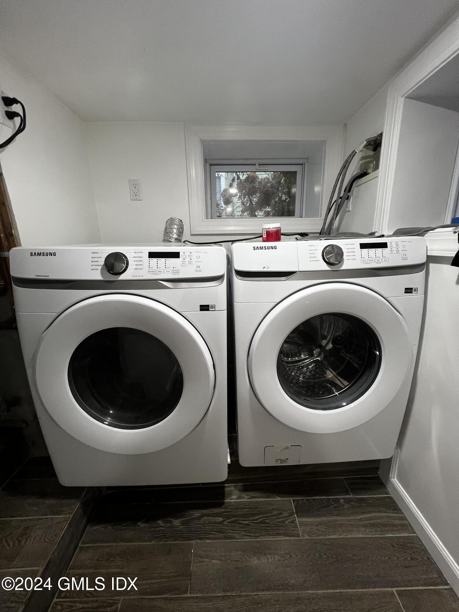 119 North Water Street, Unit 1 Greenwich, CT 06830 - Photo 10 of 11 a utility room with dryer and washer