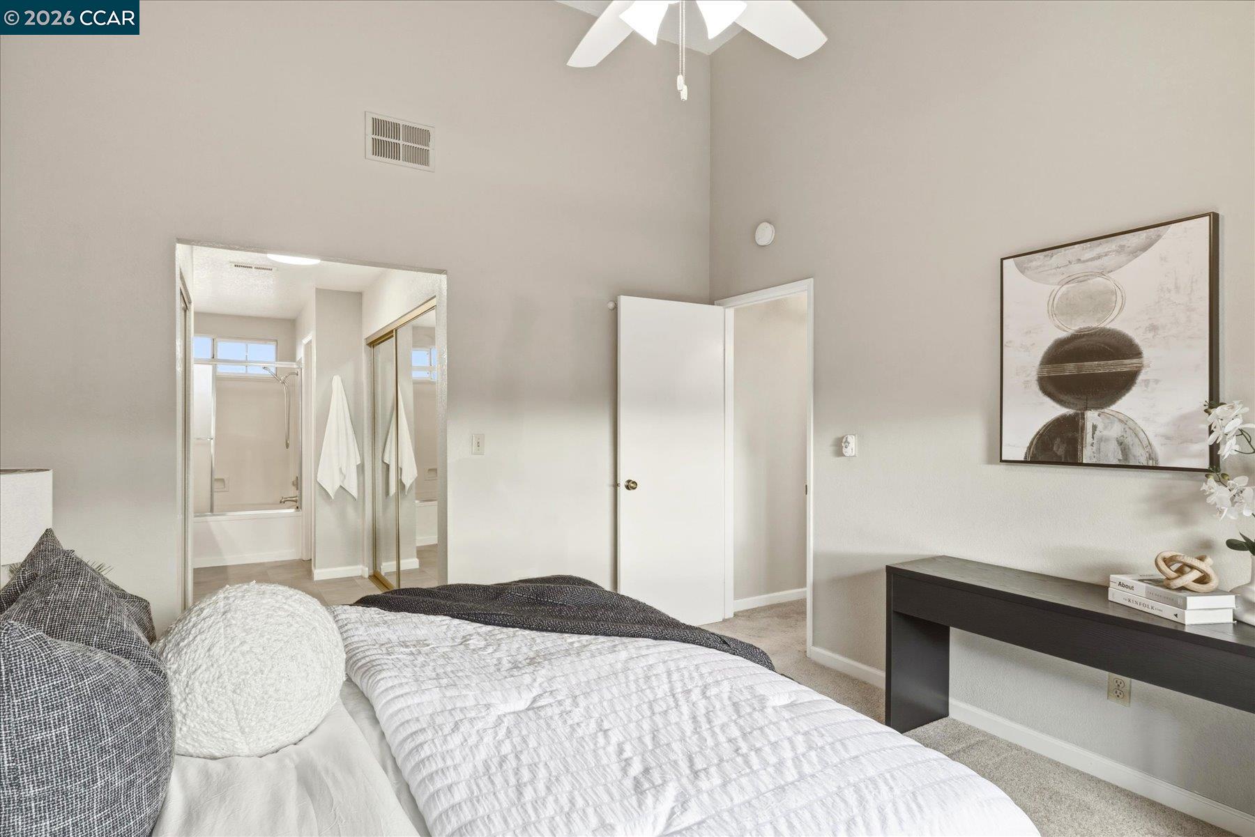 115 Cardoza Hercules, CA 94547 - Photo 22 of 35 a bedroom with a bed and a chandelier