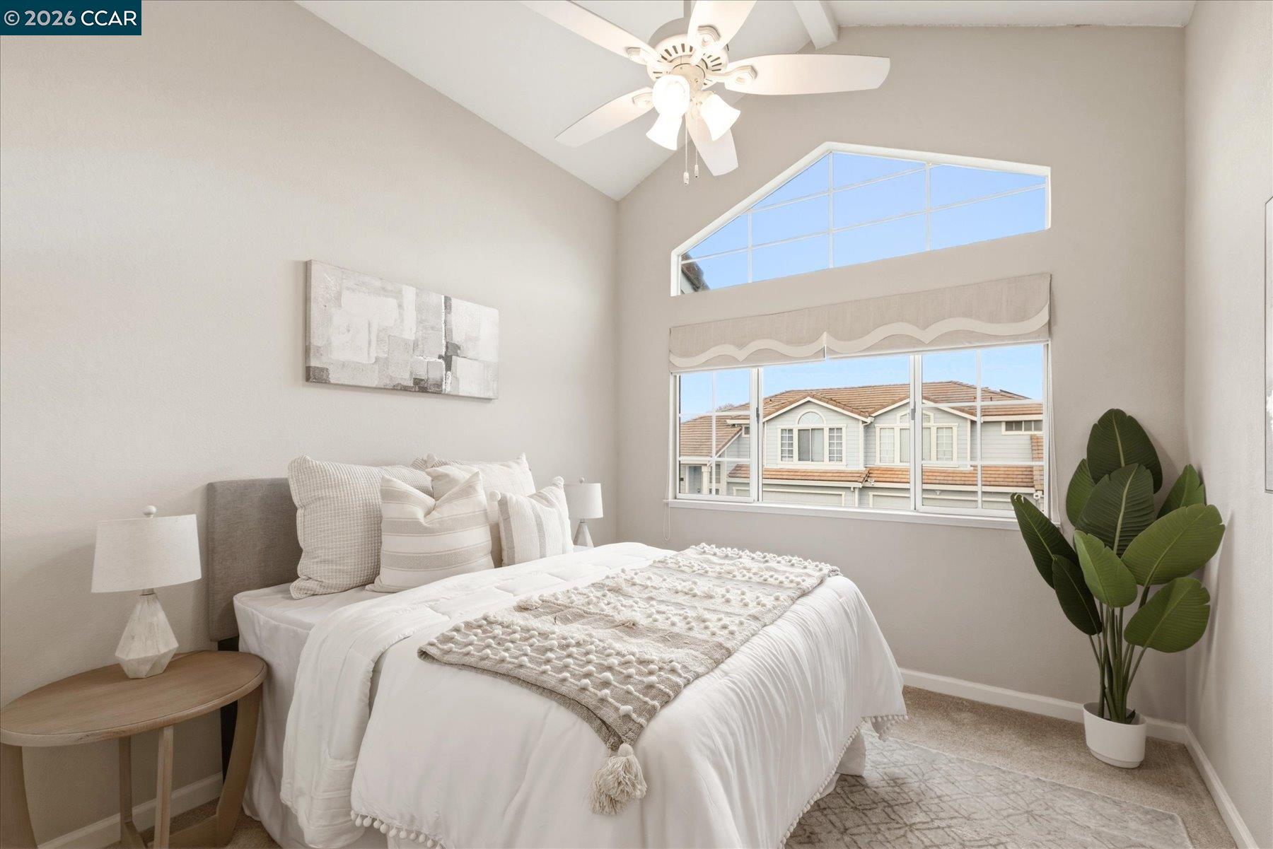 115 Cardoza Hercules, CA 94547 - Photo 25 of 35 a bedroom with a bed and a chandelier