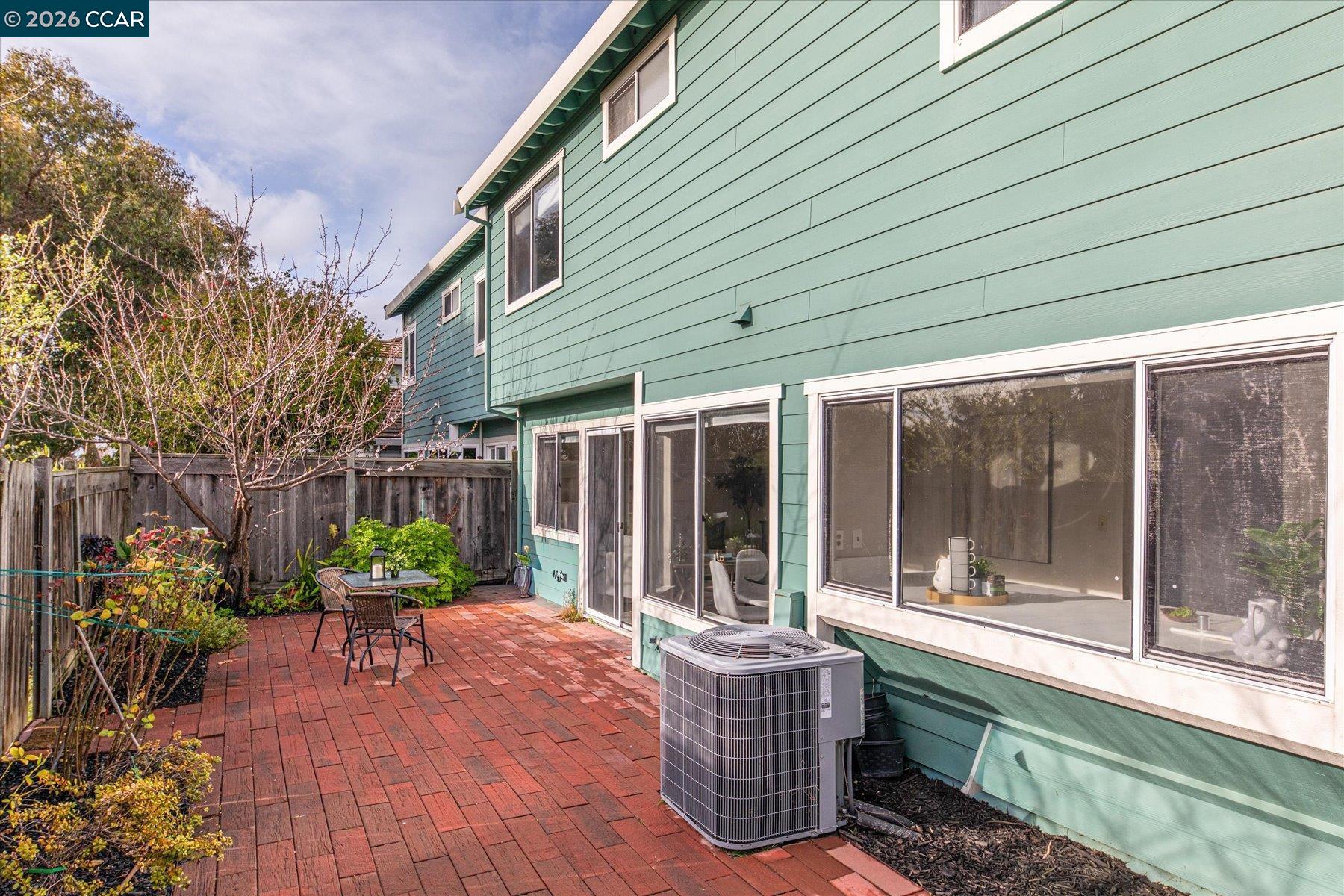 115 Cardoza Hercules, CA 94547 - Photo 29 of 35 a view of house with backyard outdoor seating and plants