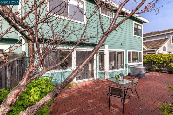 a house with trees in front of it