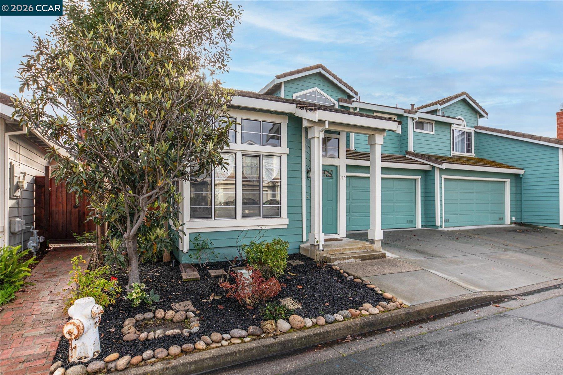 115 Cardoza Hercules, CA 94547 - Photo 3 of 35 front view of a house with a garden