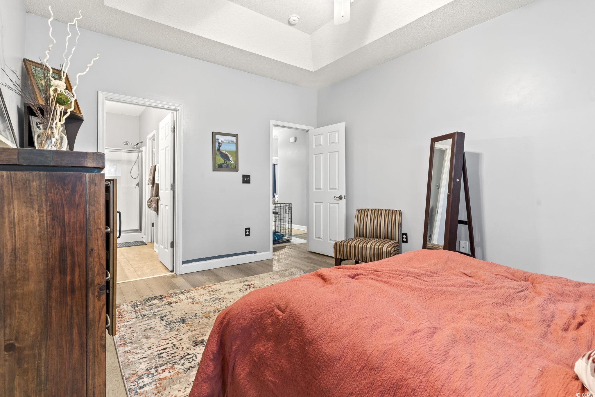 785 Rambler Court Myrtle Beach, SC 29588 - Photo 5 of 25 Bedroom with connected bathroom and light hardwood / wood-style floors