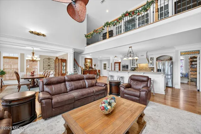 a view of a living room and dining room