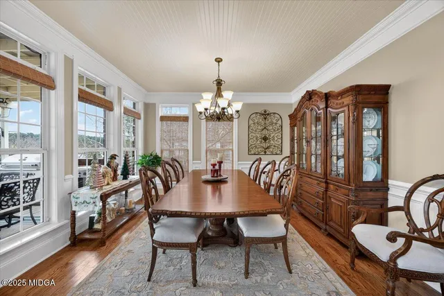 a living room with patio furniture and a fireplace