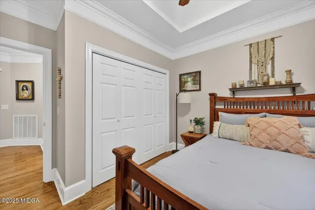 a very nice looking living room with furniture and wooden floor