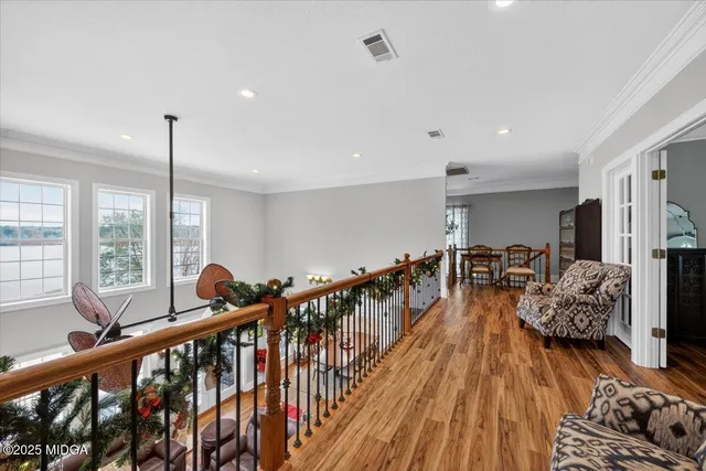 a view of a patio with a table and chairs