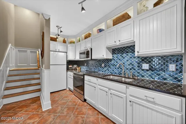 a aerial view of houses and roads