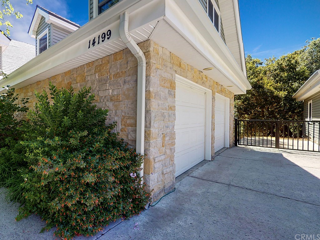 14199 Morro Road Atascadero, CA 93422 - Photo 5 of 73 Durable synthetic slate roof & protected eaves with low maintenance vinyl siding and fire resistant detailing. Not only is this home on COVETED city of Atascadero water it also has a fire hydrant at the property.