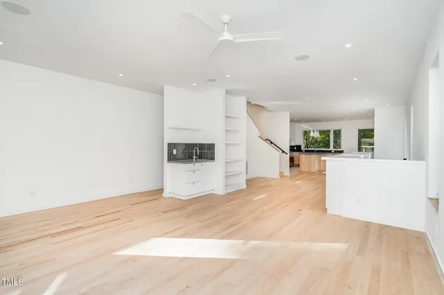 a view of a kitchen with a sink