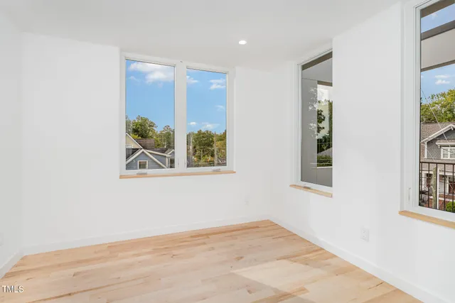 an empty room with windows