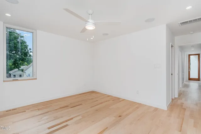 a bathroom with a double vanity sink and mirror