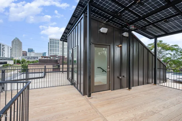 a view of a balcony with city view