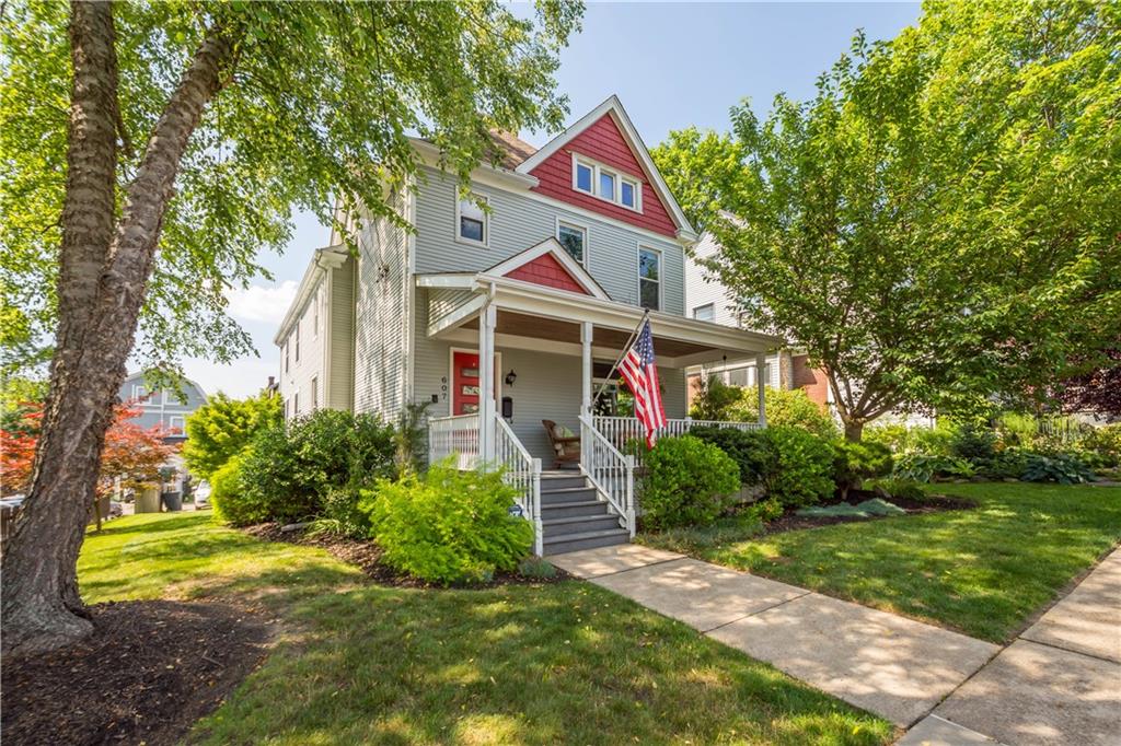 607 Broad Street Sewickley, PA 15143 - Photo 1 of 45 a front view of a house with garden