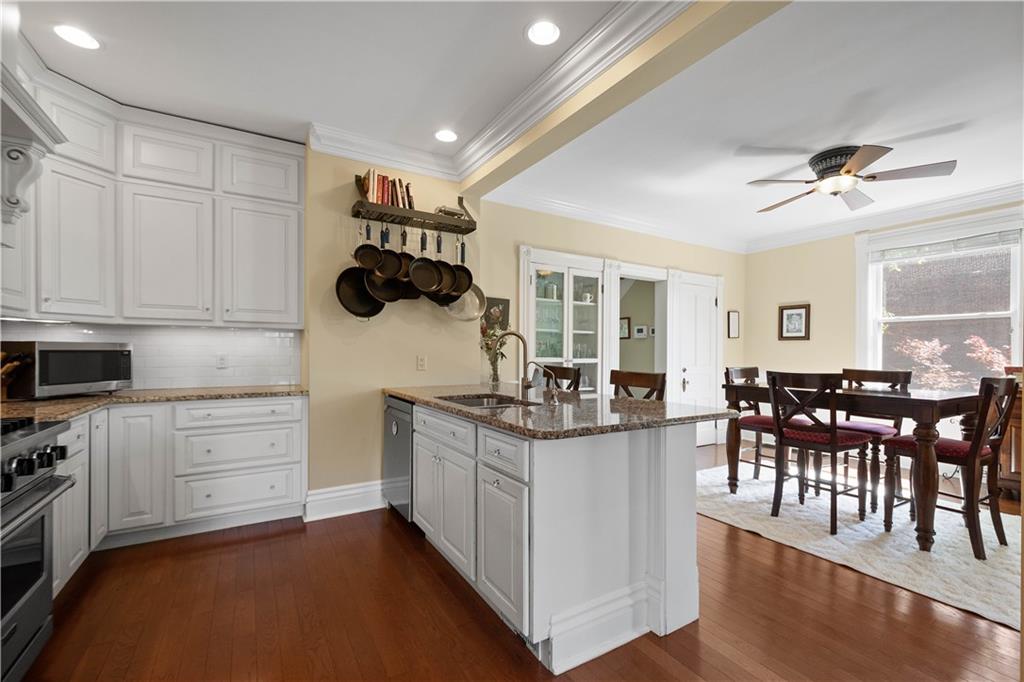 607 Broad Street Sewickley, PA 15143 - Photo 12 of 45 a kitchen with kitchen island granite countertop lots of counter top space