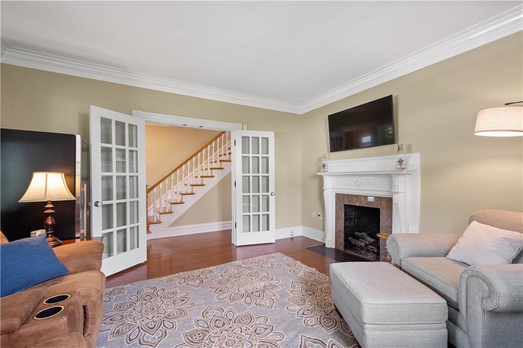607 Broad Street Sewickley, PA 15143 - Photo 17 of 45 a living room with furniture and a fireplace