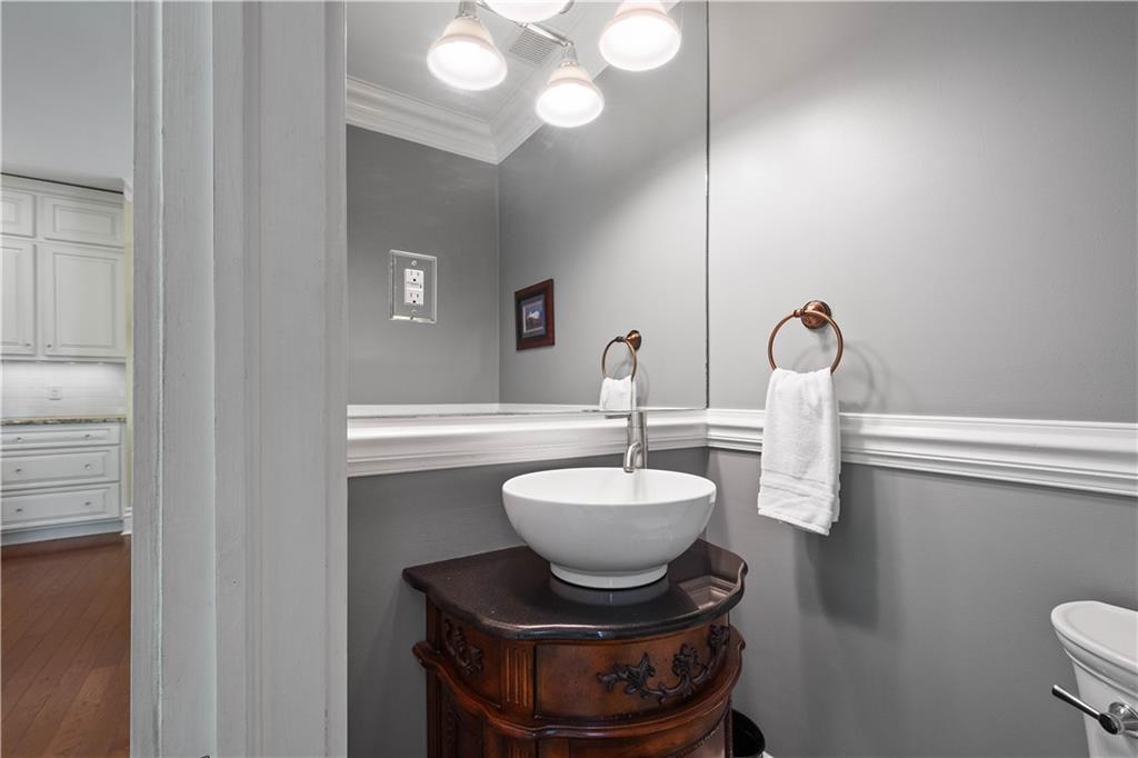 607 Broad Street Sewickley, PA 15143 - Photo 18 of 45 a bathroom with a toilet and a sink