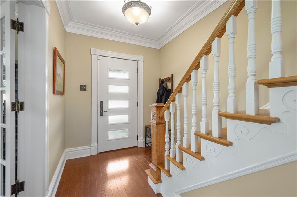 607 Broad Street Sewickley, PA 15143 - Photo 19 of 45 a view of an entryway with wooden floor and door
