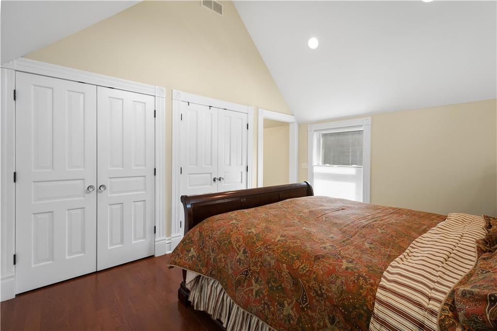 607 Broad Street Sewickley, PA 15143 - Photo 21 of 45 a bedroom with a bed and a window