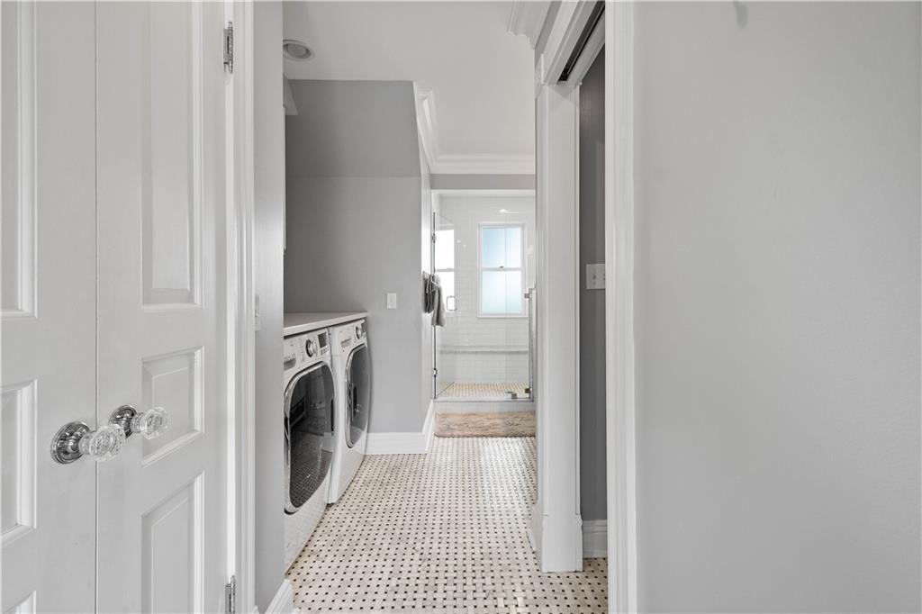 607 Broad Street Sewickley, PA 15143 - Photo 23 of 45 a bathroom with a bathtub and a shower