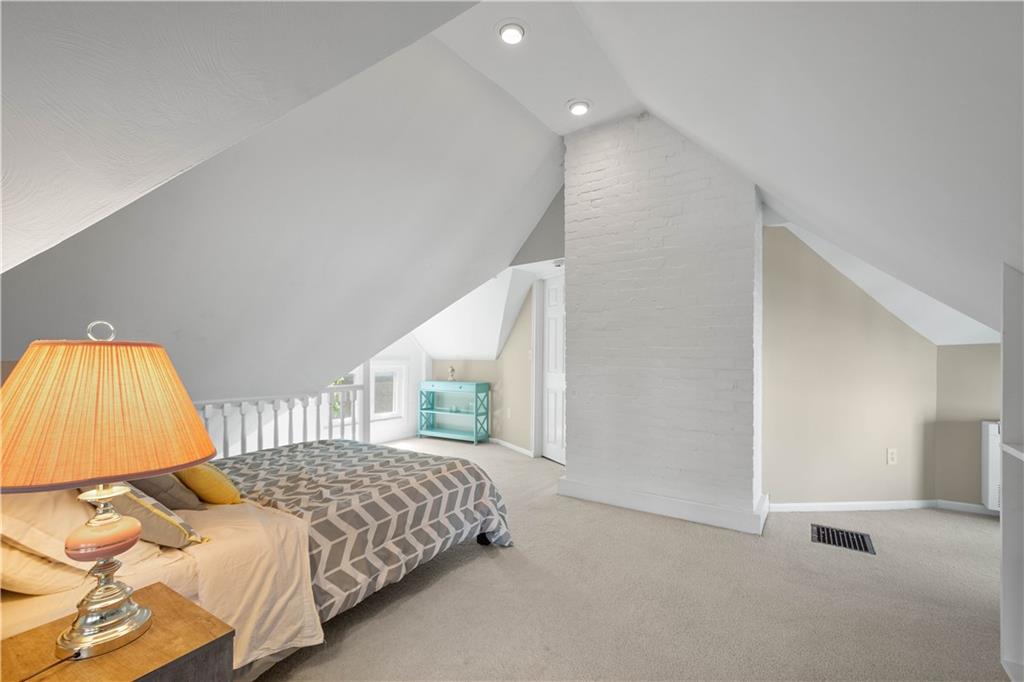 607 Broad Street Sewickley, PA 15143 - Photo 33 of 45 a bedroom with a bed and a window