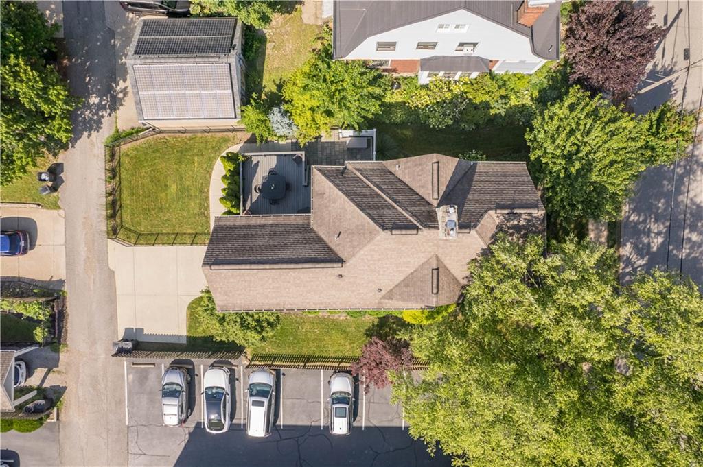 607 Broad Street Sewickley, PA 15143 - Photo 42 of 45 a aerial view of a house with garden space and sitting area