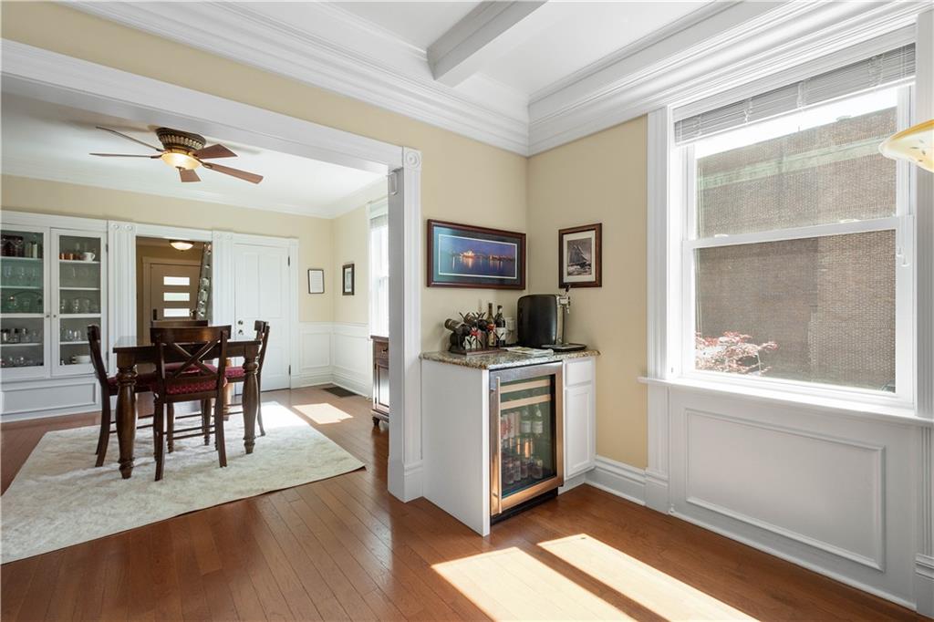 607 Broad Street Sewickley, PA 15143 - Photo 7 of 45 a view of a dining room with furniture window and wooden floor