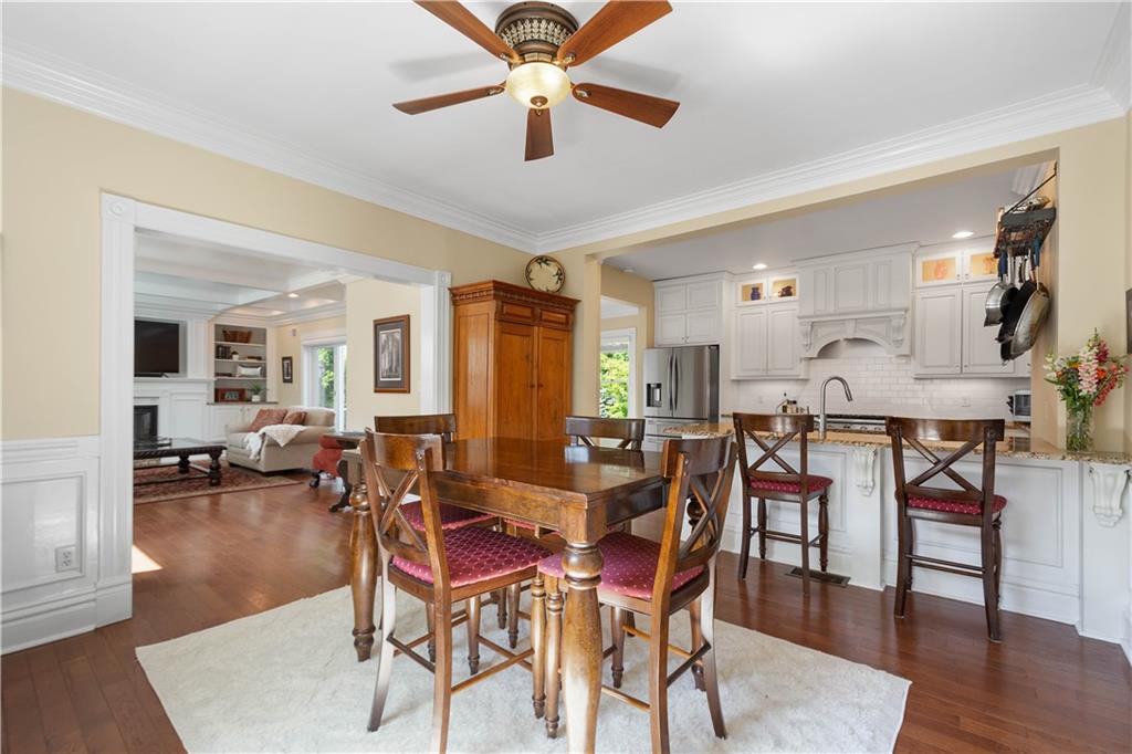 607 Broad Street Sewickley, PA 15143 - Photo 9 of 45 a view of a dining room with furniture and wooden floor